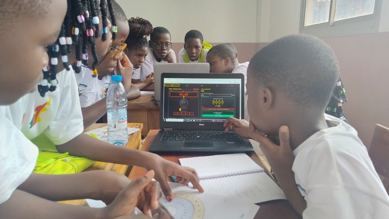 Students exploring cryptography and coding activities